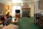 Mammoth Lakes Condo Rental Sunshine Village 177 - Open Living Room with Woodstove